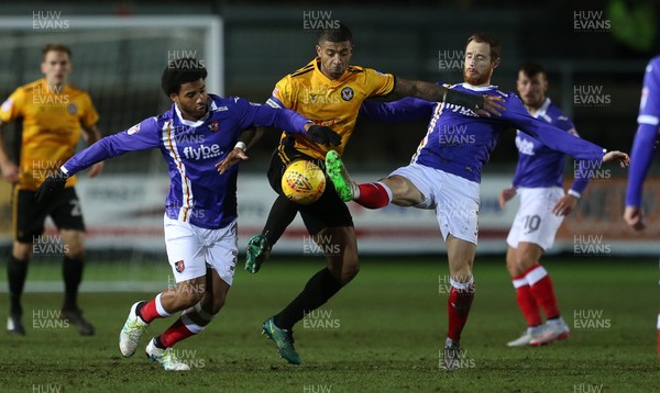 010118 - Newport Count v Exeter City - SkyBet League Two - Joss Labadie of Newport County is tackled by Reuben Reid and Ryan Harley of Exeter City