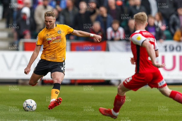 020422 - Newport County v Exeter City - Sky Bet League 2 - Cameron Norman of Newport County clears the ball