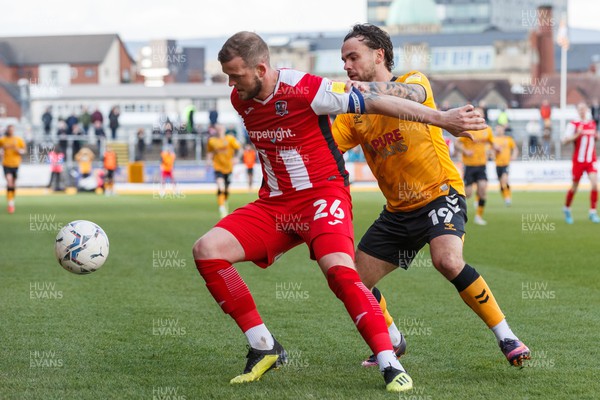 020422 - Newport County v Exeter City - Sky Bet League 2 - Pierce Sweeney of Exeter City and Dominic Telford of Newport County battle for the ball