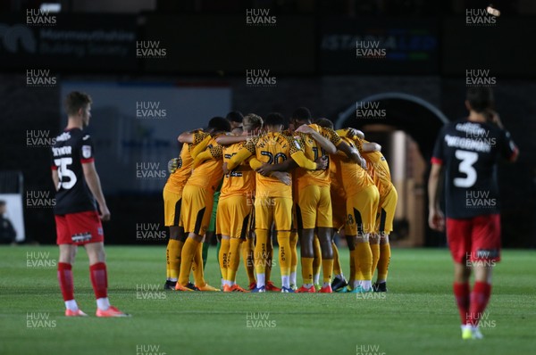 081019 - Newport County v Exeter City, EFL leasingcom Trophy - The Newport County team huddle together at the start of the match