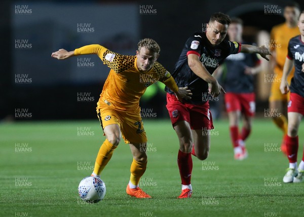 081019 - Newport County v Exeter City, EFL leasingcom Trophy - Taylor Maloney of Newport County gets away from Jordan Tillson of Exeter City