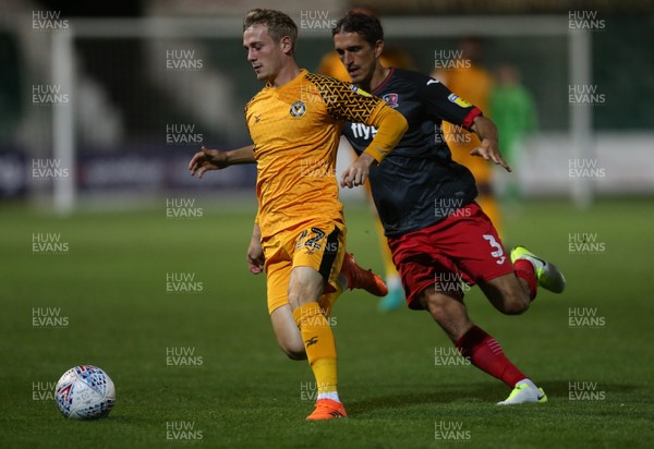 081019 - Newport County v Exeter City, EFL leasingcom Trophy - Taylor Maloney of Newport County is challenged by Craig Woodman of Exeter City