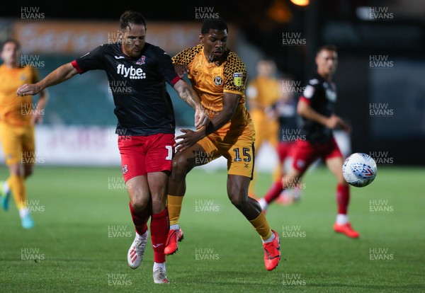 081019 - Newport County v Exeter City, EFL leasingcom Trophy - Tristan Abrahams of Newport County and Tom Parkes of Exeter City compete for the ball