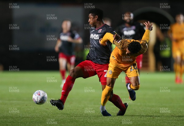 081019 - Newport County v Exeter City, EFL leasingcom Trophy - Corey Whiteley of Newport County and Jayden Richardson of Exeter City compete for the ball