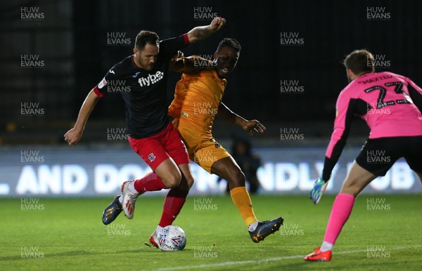 081019 - Newport County v Exeter City, EFL leasingcom Trophy - Dominic Poleon of Newport County is denied a chance to score as he is tackled by Tom Parkes of Exeter City