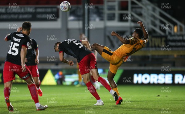081019 - Newport County v Exeter City, EFL leasingcom Trophy - Aaron Martin of Exeter City is challenged by Tristan Abrahams of Newport County