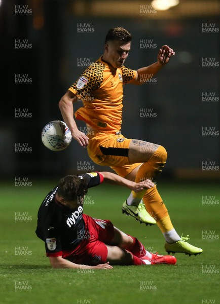 081019 - Newport County v Exeter City, EFL leasingcom Trophy - George Nurse of Newport County and Will Dean of Exeter City compete for the ball