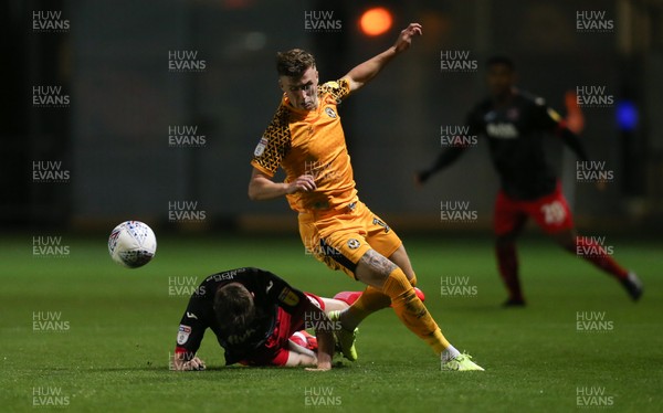 081019 - Newport County v Exeter City, EFL leasingcom Trophy - George Nurse of Newport County and Will Dean of Exeter City compete for the ball
