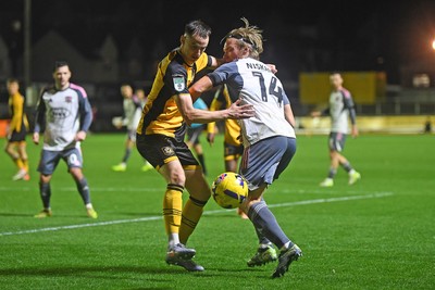 111125 - Newport County v Exeter City - Vertu Trophy - Ciaran Brennan of Newport County is challenged by Ilmari Niskanen of Exeter