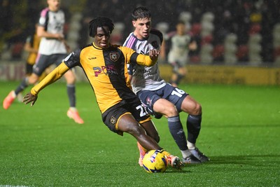111125 - Newport County v Exeter City - Vertu Trophy - Habeeb Ogunneye of Newport County is challenged by Sil Swinkels of Exeter