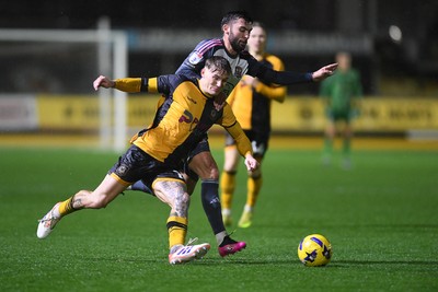 111125 - Newport County v Exeter City - Vertu Trophy - Kai Whitmore of Newport County is challenged by Reece Cole of Exeter