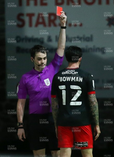 160221 - Newport County v Exeter City, Sky Bet League 2 - Ryan Bowman of Exeter City is shown a red card for a challenge on Mickey Demetriou of Newport County It was Exeter's second red card of the match