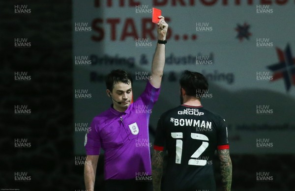160221 - Newport County v Exeter City, Sky Bet League 2 - Ryan Bowman of Exeter City is shown a red card for a challenge on Mickey Demetriou of Newport County It was Exeter's second red card of the match