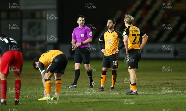 160221 - Newport County v Exeter City, Sky Bet League 2 - Newport County players show dejection at the end of the match after being held by 9 men Exeter City