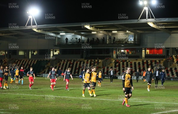 160221 - Newport County v Exeter City, Sky Bet League 2 - Newport County players make their way back to the changing room after being held to a 1-1 draw by 9 men Exeter City