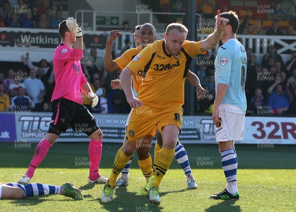 160314 - Newport County v Exeter City, Sky Bet League 2 - Newport's Lee Minshull wheels away to celebrate after he scores goal