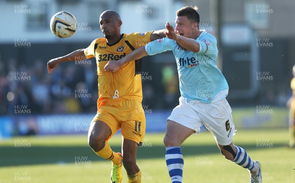 160314 - Newport County v Exeter City, Sky Bet League 2 - Newport's Chris Zebroski and Exeter's Danny Coles compete for the ball