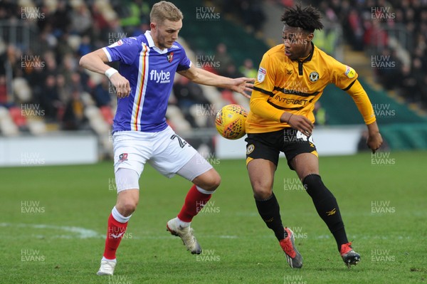 190119 - Newport County v Exeter City - Sky Bet League 2 - Antoine Semenyo of Newport County and Dean Moxey of Exeter City compete for the ball