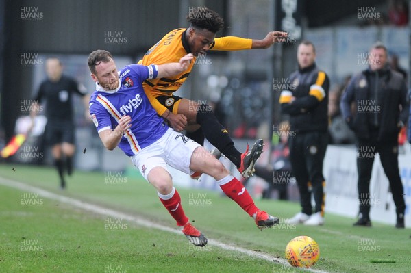 190119 - Newport County v Exeter City - Sky Bet League 2 - Antoine Semenyo of Newport County is tackled by Jake Taylor of Exeter City 