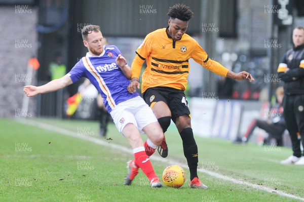 190119 - Newport County v Exeter City - Sky Bet League 2 - Antoine Semenyo of Newport County is tackled by Jake Taylor of Exeter City 