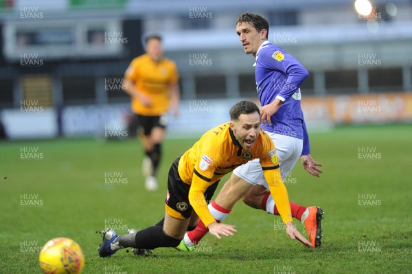 190119 - Newport County v Exeter City - Sky Bet League 2 -  Robbie Willmott of Newport County is brought down by Craig Woodman of Exeter City