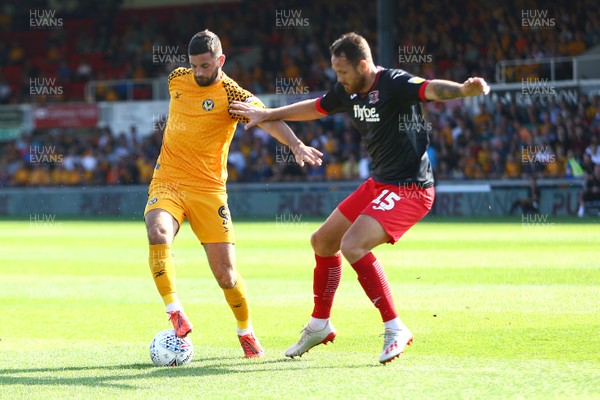 210919 Newport County vs Exeter City - Sky Bet League 2 - Padraig Amond of Newport County takes on Tom Parkes of Exeter City 