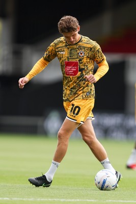 120926 - Newport County v Fleetwood Town - Sky Bet League 2 - Harrison Biggins of Newport County warms up 