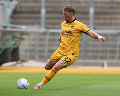 120926 - Newport County v Fleetwood Town - Sky Bet League 2 - Cameron Norman of Newport County kicks the ball 