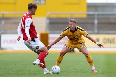 120926 - Newport County v Fleetwood Town - Sky Bet League 2 - Cameron Norman of Newport County marks Lewis McCann of Fleetwood Town