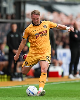 120926 - Newport County v Fleetwood Town - Sky Bet League 2 - Cameron Norman of Newport County crosses the ball