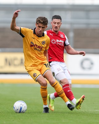 120926 - Newport County v Fleetwood Town - Sky Bet League 2 - Harrison Biggins of Newport County controls the ball with pressure from Ronan Coughlan of Fleetwood Town
