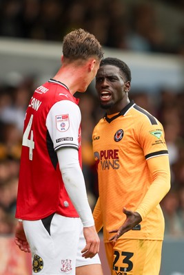 120926 - Newport County v Fleetwood Town - Sky Bet League 2 - Michael Adu-Poku of Newport County confronts Lewis McCann of Fleetwood Town