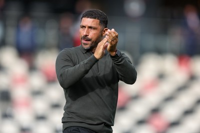 120926 - Newport County v Fleetwood Town - Sky Bet League 2 - Hayden Mullins Manager of Newport County applauds the fans at full-time