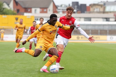 120926 - Newport County v Fleetwood Town - Sky Bet League 2 - Michael Adu-Poku of Newport County attacks with pressure from Lewis McCann of Fleetwood Town