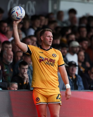 120926 - Newport County v Fleetwood Town - Sky Bet League 2 - Cameron Norman of Newport County takes a throw in