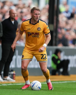 120926 - Newport County v Fleetwood Town - Sky Bet League 2 - Cameron Norman of Newport County attacks