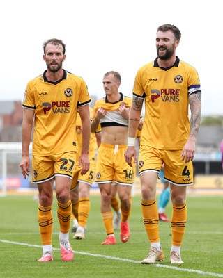 120926 - Newport County v Fleetwood Town - Sky Bet League 2 - Christian Doidge (L) and Kyle Cameron of Newport County (R) make their way to the tunnel at half-time