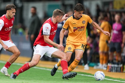 120926 - Newport County v Fleetwood Town - Sky Bet League 2 - Harrison Neal of Fleetwood Town tackles Harrison Biggins of Newport County