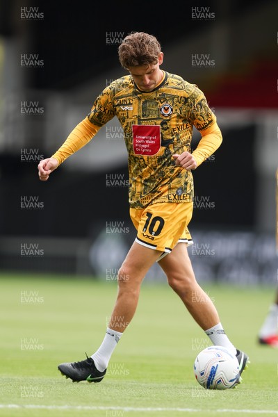 120926 - Newport County v Fleetwood Town - Sky Bet League 2 - Harrison Biggins of Newport County warms up 