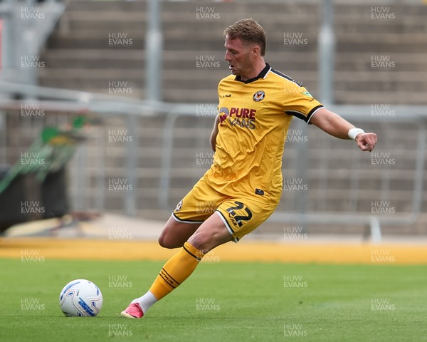 120926 - Newport County v Fleetwood Town - Sky Bet League 2 - Cameron Norman of Newport County kicks the ball 