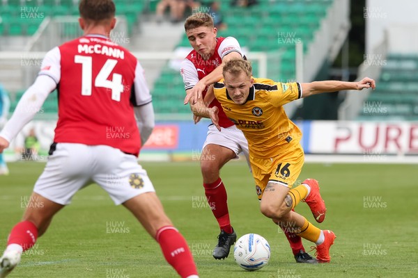 120926 - Newport County v Fleetwood Town - Sky Bet League 2 - Harrison Neal of Fleetwood Town fouls Matty Jacob of Newport County