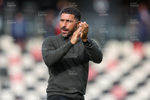 120926 - Newport County v Fleetwood Town - Sky Bet League 2 - Hayden Mullins Manager of Newport County applauds the fans at full-time