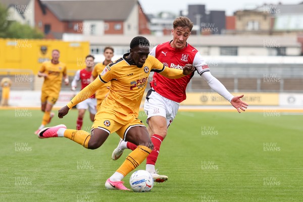 120926 - Newport County v Fleetwood Town - Sky Bet League 2 - Michael Adu-Poku of Newport County attacks with pressure from Lewis McCann of Fleetwood Town