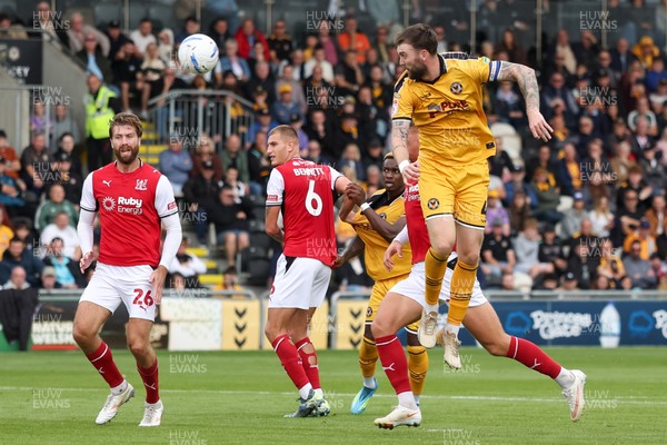 120926 - Newport County v Fleetwood Town - Sky Bet League 2 - Kyle Cameron of Newport County has a headed attempt at goal