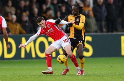 131225 - Newport County v Fleetwood Town, EFL Sky Bet League 2 - Mark Helm of Fleetwood Town and Cameron Antwi of Newport County compete for the ball