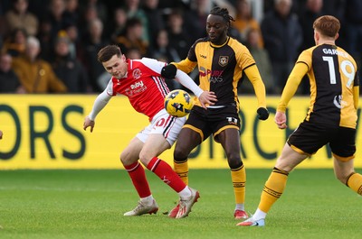 131225 - Newport County v Fleetwood Town, EFL Sky Bet League 2 - Mark Helm of Fleetwood Town and Cameron Antwi of Newport County compete for the ball