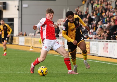 131225 - Newport County v Fleetwood Town, EFL Sky Bet League 2 - Bobby Kamwa of Newport County gets away from Ethan Ennis of Fleetwood Town