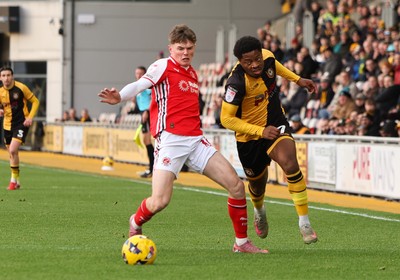 131225 - Newport County v Fleetwood Town, EFL Sky Bet League 2 - Bobby Kamwa of Newport County gets away from Ethan Ennis of Fleetwood Town
