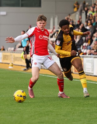 131225 - Newport County v Fleetwood Town, EFL Sky Bet League 2 - Bobby Kamwa of Newport County gets away from Ethan Ennis of Fleetwood Town