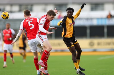 131225 - Newport County v Fleetwood Town, EFL Sky Bet League 2 - Nathan Opoku of Newport County heads the ball forward